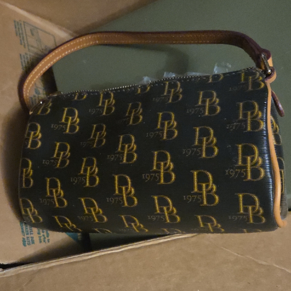 Dooney & Bourke Black and Gold Logo Barrel Bag